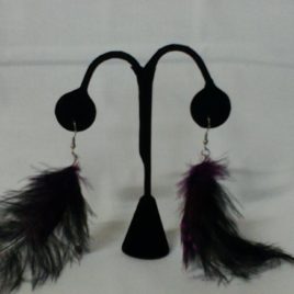 Boucles d’oreilles plume toute en légèreté.